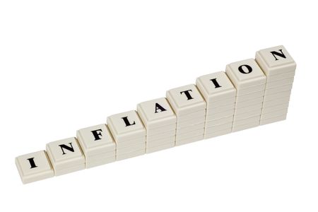 Stack of increasing blocks showing the word INFLATION isolated on white backgroundの写真素材