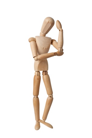 Wooden mannequin arms folded deep in thought isolated on white backgroundの写真素材