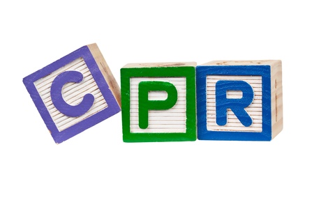 Wooden blocks forming the letters CPR isolated on white backgroundの写真素材