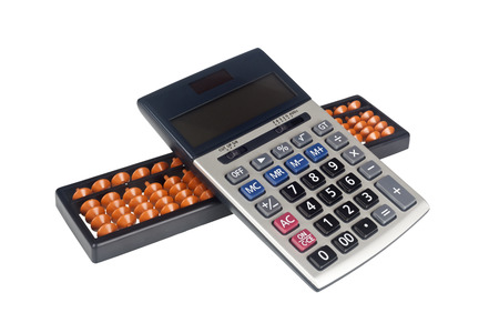 Calculator stacked on top of an abacus isolated on white backgroundの写真素材