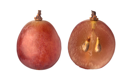 Single and halved red globe grape isolated on white backgroundの写真素材