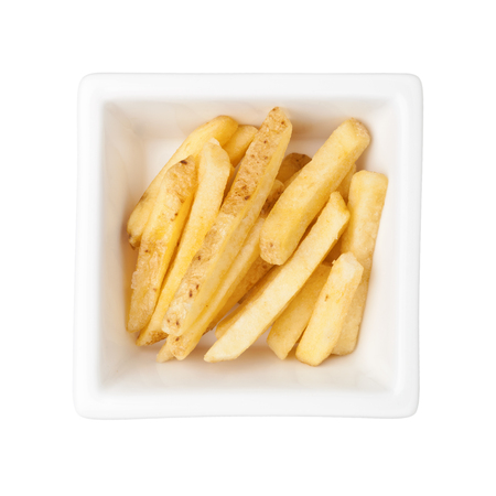 Pieces of french fries in a square bowl isolated on white background