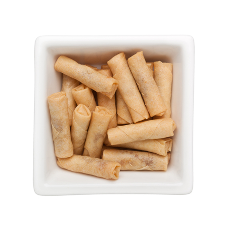 Spicy dried prawn rolls in a square bowl isolated on white background