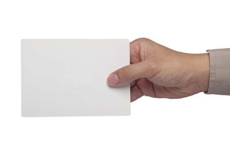 Hand holding a blank rectangular paper card isolated on white background
の写真素材