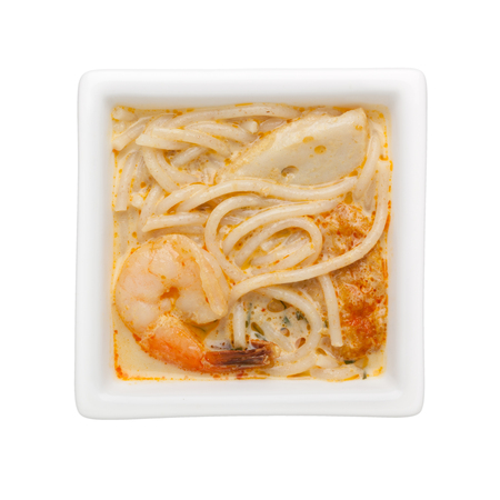 Nonya laksa in a square bowl isolated on white background
の写真素材
