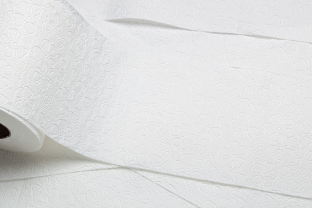 Closeup of rolls of overlapping toilet paper 
の写真素材