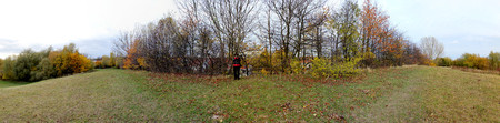   Panoramic view of a photographer on a hill in Greifswald, Mecklenburg-Vorpommern, Germany の写真素材