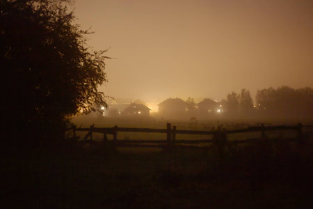Rural suburb of Greifswald, Mecklenburg-Vorpommern, Germany, covered in fog and mist in the evening.の写真素材