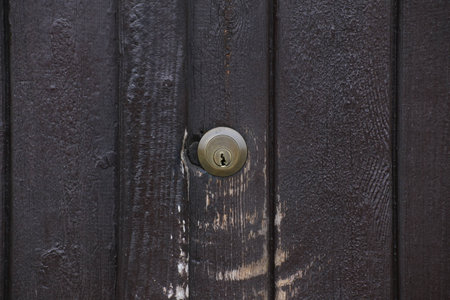 Doorlock at the outside of a gate.の写真素材