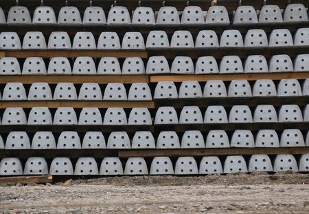 New concrete railroad ties waiting for installation.の写真素材