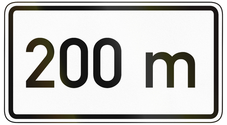 German traffic sign additional panel to specify the meaning of other signs: 100 meters ahead.の写真素材