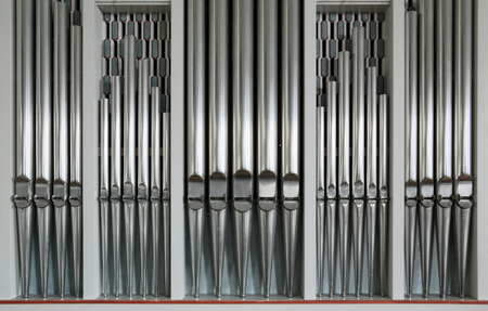 Five rows of pipes of a church organ.の写真素材