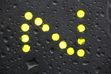 LEDs in a metal surface with water drops.