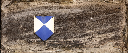 Brick with a monument protection sign in Germany.の写真素材