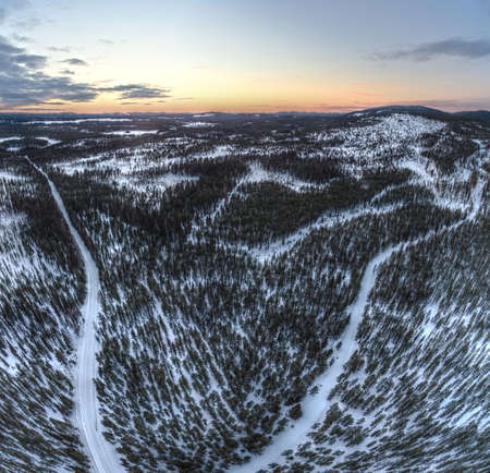 Wide angle shot of dusk over Sandberget in Swedish lapland.の写真素材