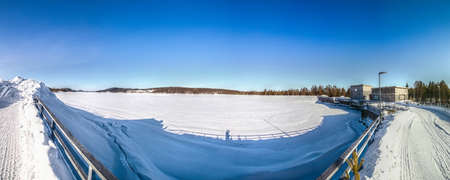 View from Gallejaur dam on frozen reservoir in lapland.の写真素材
