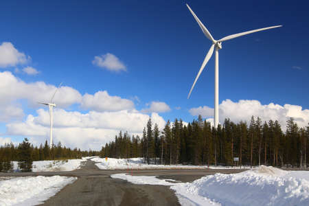 Snowy road in Amliden wind park in Sweden.の写真素材