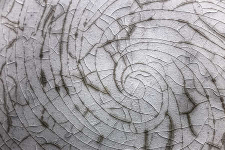 Abstract spiral shaped cracks in enamel surface.の写真素材
