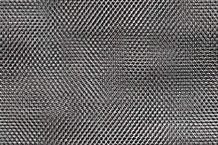 Seamlessly tileable rendered texture with a metallic pattern.の写真素材