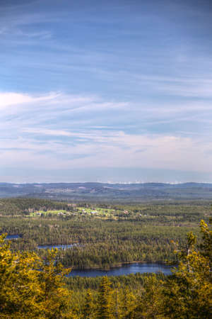 Scenic lakes and houses seen from Swedish mountain Stor-Sandberget.の写真素材