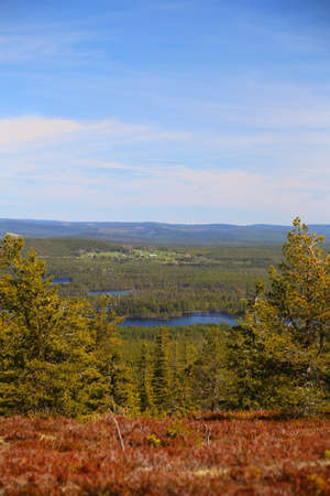 Scenic lakes and houses seen from Swedish mountain Stor-Sandberget.の写真素材