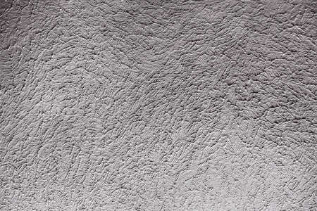 Roughly textured surface of a painted wall .の写真素材
