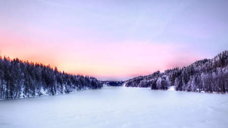 Winterly shot of Skelleft river in Swedish Lapland.の写真素材