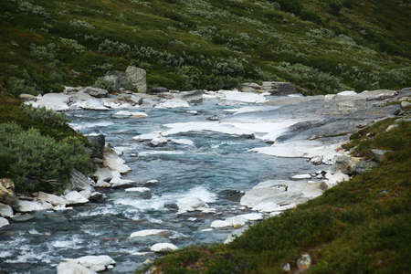 Rapids and rocks in Swedish Lapland near Abisko.の写真素材