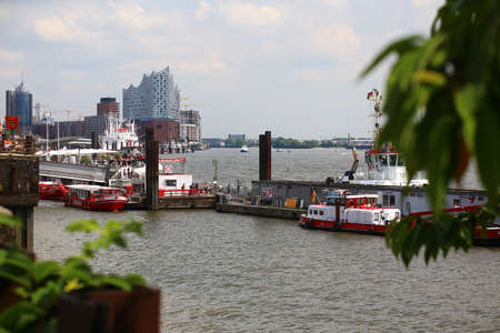 HAMBURG, GERMANY - JUNE 27 2021: Various ships landing at the port of Hamburg.のeditorial素材