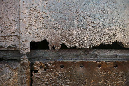 Old and rusty metal sheets with blanks.