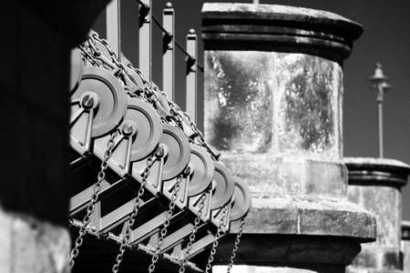 Black and white shot of mechanisms at historic Pretzien Weir.の写真素材