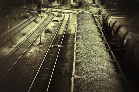 Grungy sepia shot of train filled with gravel.の写真素材