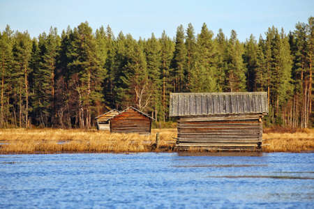 Wooden sheds at Svansele Dammangar nature reserve in Sweden.の写真素材