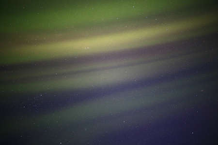 Soft northern light curtains in the sky.の写真素材