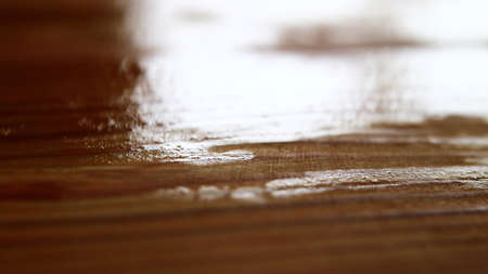 Uneven layer of linseed oil paint on wooden surface.の写真素材