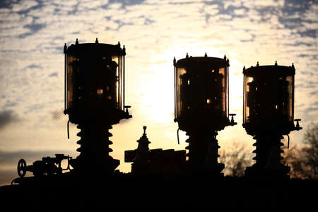 Abstract shot of vintage industrial device with valves and electrical components.の写真素材