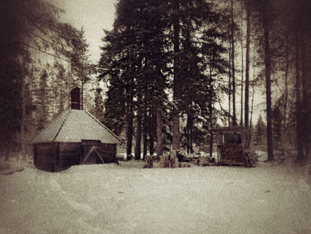 Grungy shot of simple shack in Swedish Lapland.の写真素材