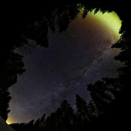 Diagonal wide angle upward shot with aurora and dusk.の写真素材