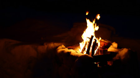 Big fire in a masoned fireplace in winter.の写真素材