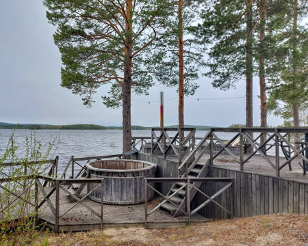 Wooden hot tubs at lakeside in northern Sweden.の写真素材