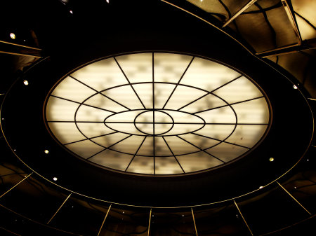 Conceptual high contrast shot of oval lighting at the ceiling.の写真素材