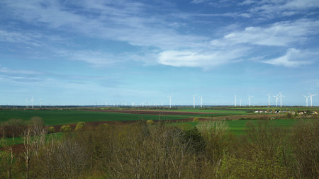 View over springtime fields in Saxony-Anhalt with the town of Irxleben on the right.