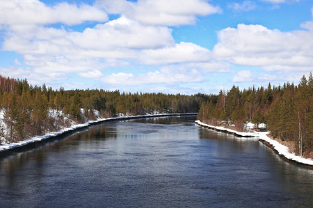 Skellefte river in northern Sweden with frozen riverbanks.