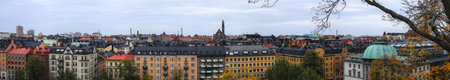 Stockholm cityscape view from observatorielunden, showcasing rooftops and skyline in autumn colors.の写真素材