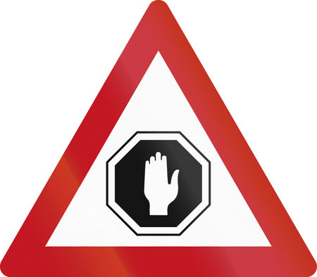 Road warning sign - Stop Ahead.の写真素材