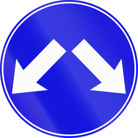Israel mandatory road sign - keep left or right.の写真素材