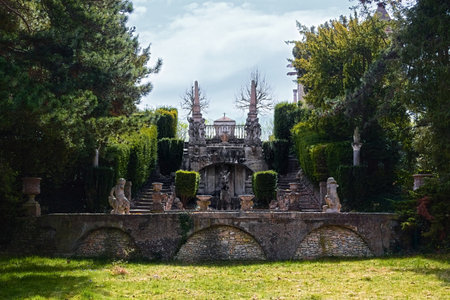 Formal garden terrace of Roseburg, Germany, featuring symmetrical stone stairs, statues, and...