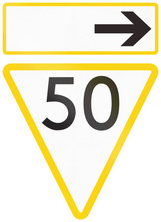 Railway speed limit sign in the UK - 50 mph limit on the route to the right ahead.の写真素材