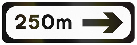 Supplementary road sign used in Ireland - 250 meters right.