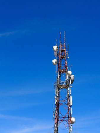 Antenna of Communication Building and blue skyの写真素材